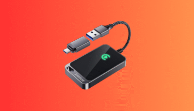 The sleek aluminum Wireless CarPlay Adapter providing a seamless, cable-free connection to a car's infotainment screen.