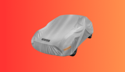 The Motor Trend SafeKeeper heavy duty car cover providing all-weather, multi-layered protection for an SUV.