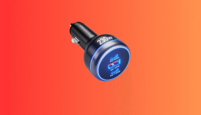 The SUNDAREE 230W USB C car charger providing fast charging to a laptop and two smartphones simultaneously.